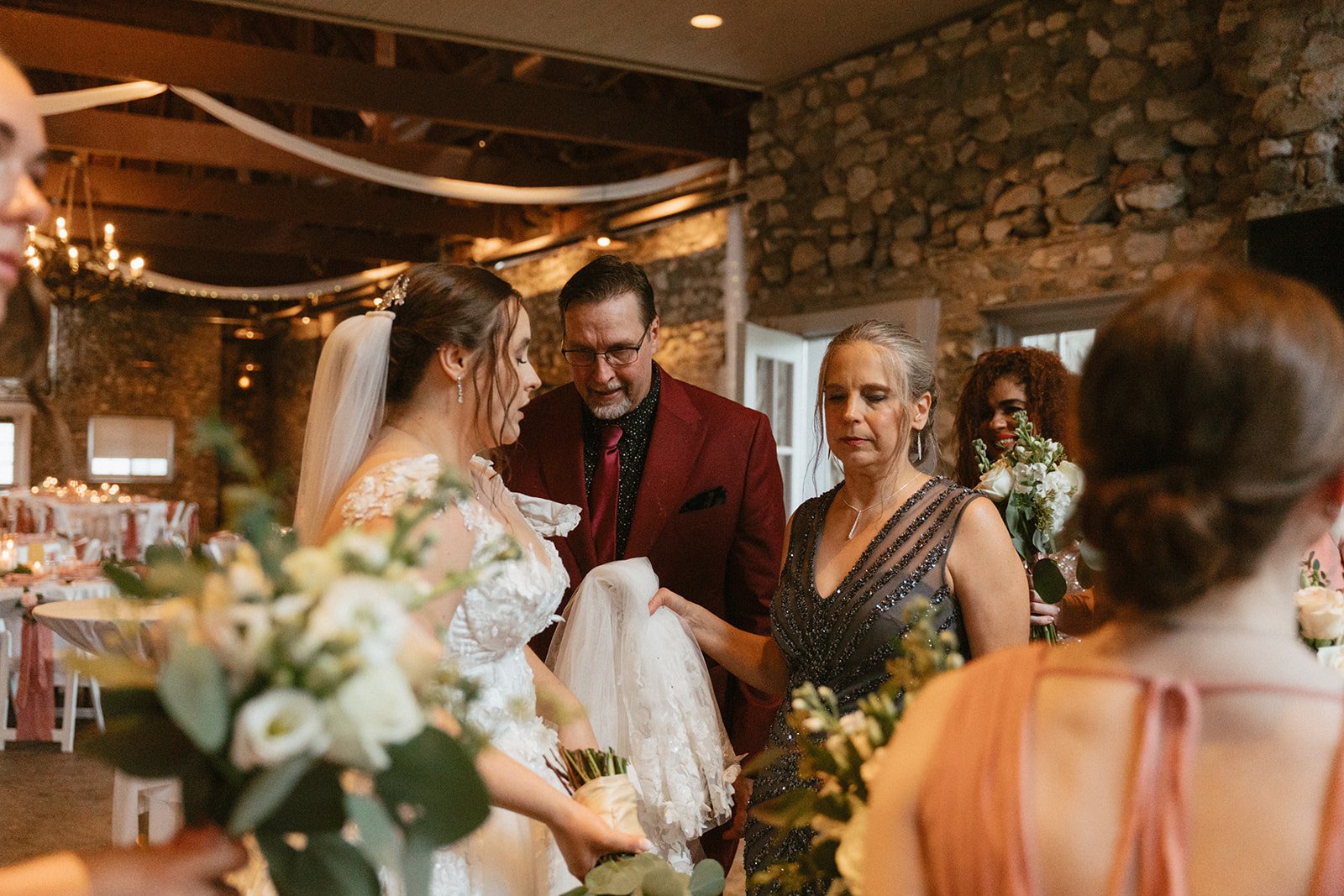 Bride and groom celebrating inside the reception dining room